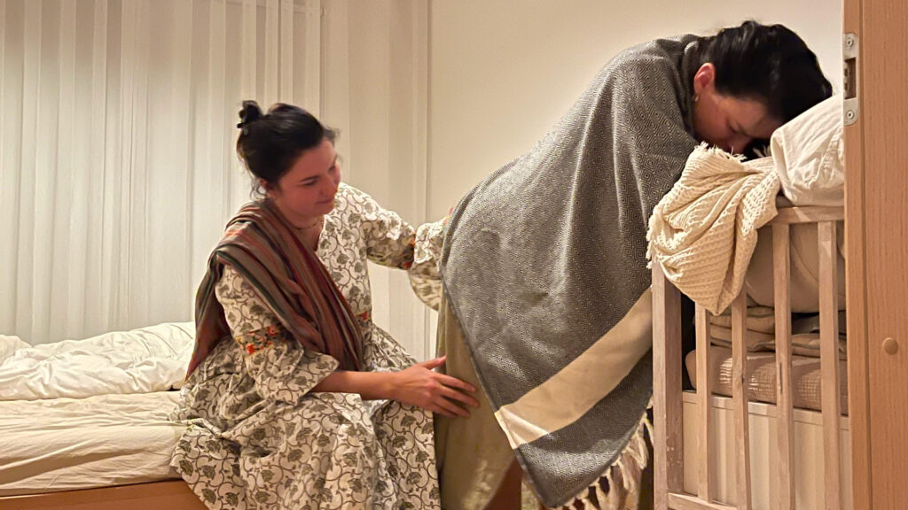 Doula helping a woman in labor to relax